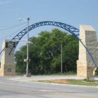 an archway over Oglethorpe Boulevard at Front Street welcomes visitors to downtown Albany