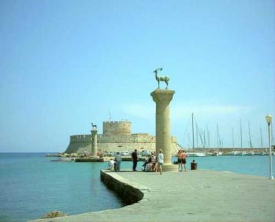 the harbor of Mandraki, where the Colossus of Rhodes once stood